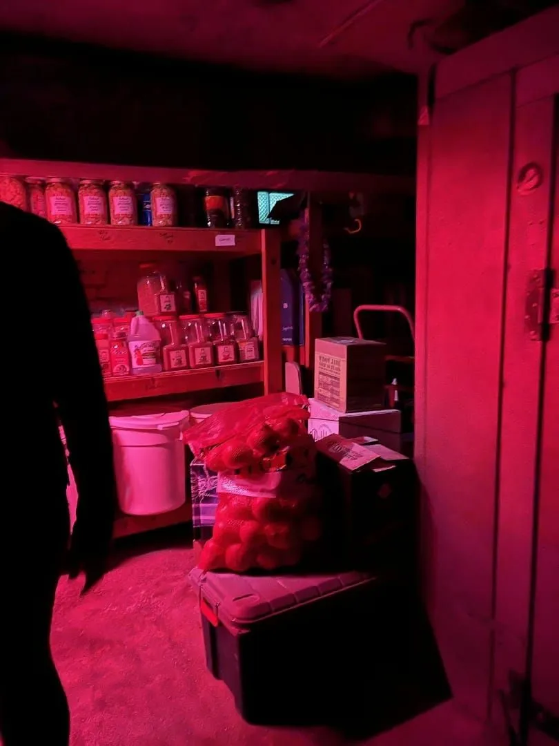 Dimly lit room with stored goods