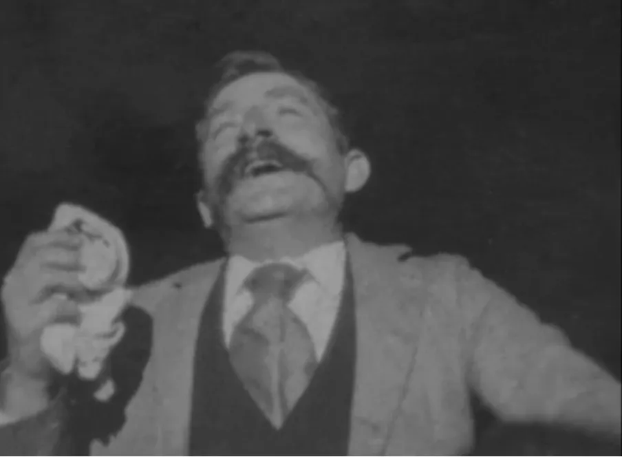 Black and white man sneezing image