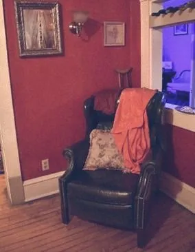 Cozy chair with pillow and blanket