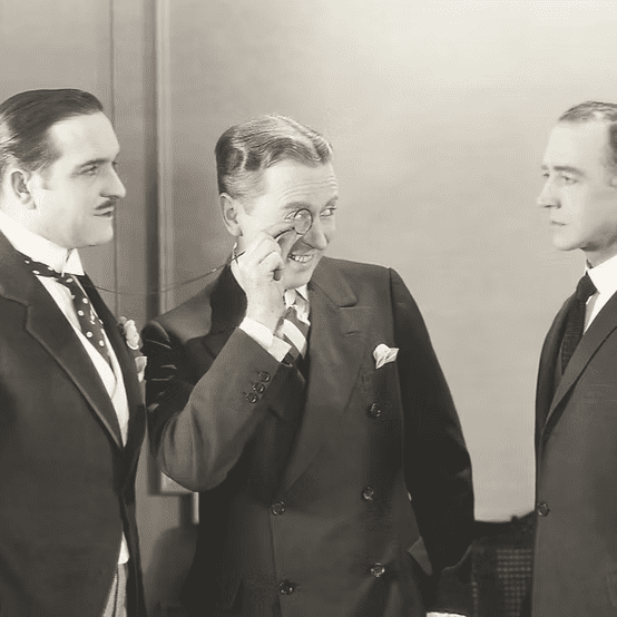 Three men in vintage suits conversing