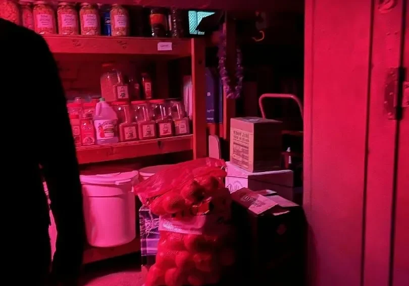 Dimly lit room with stored goods