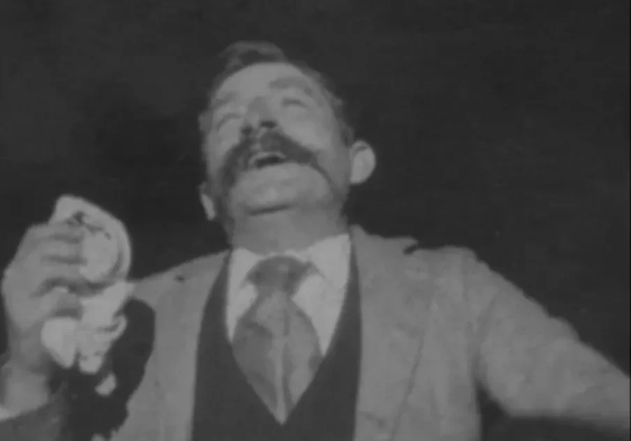Black and white man sneezing image